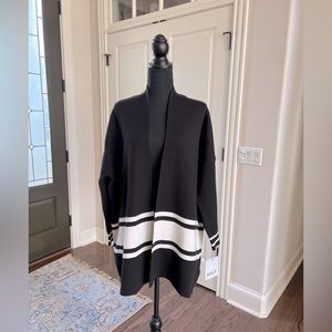 Ladies small open front sweater.